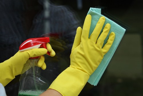 Cleaner Watford team working safely with protective equipment