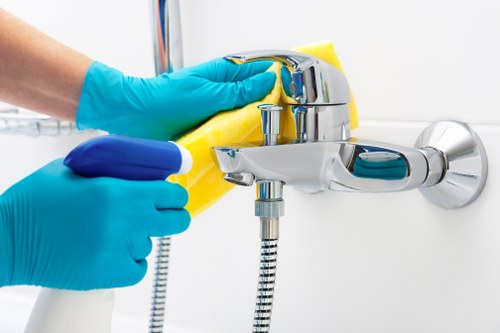 Cleaning hanging curtains in a Watford room