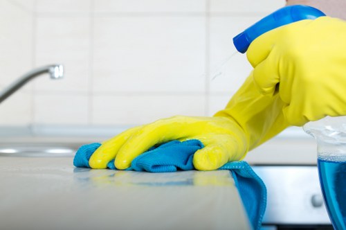 Staff member documenting a cleaning complaint for follow-up